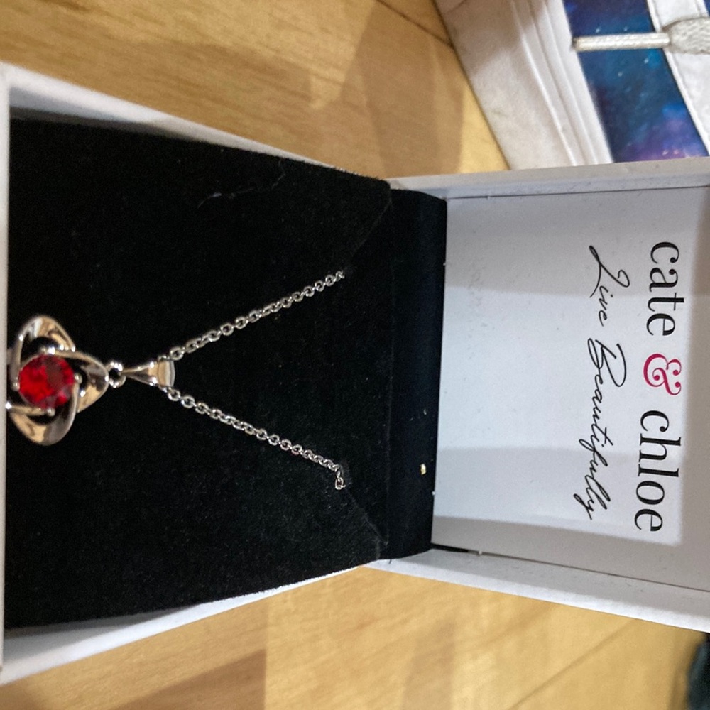 Silver chain necklace , red center ruby